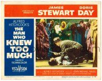8p671 MAN WHO KNEW TOO MUCH LC #2 '56 great image of Jimmy Stewart over man w/knife, Hitchcock!
