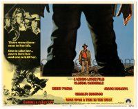 8p722 ONCE UPON A TIME IN THE WEST LC #6 '69 great image of Bronson through Fonda's legs, Leone!
