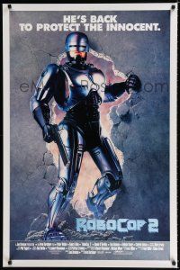 8t639 ROBOCOP 2 int'l 1sh '90 cyborg policeman Peter Weller busts through wall, scii-fi sequel!