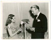 9a204 CONSTANCE MOORE/DENNIS O'KEEFE 7.75x10 still '40 she lets a parrot pick his show tickets!