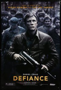 9b197 DEFIANCE teaser DS 1sh '08 Edward Zwick directed, rugged Daniel Craig w/machine gun!