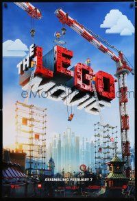 9b399 LEGO MOVIE teaser DS 1sh '14 cool image of title assembled w/cranes & plastic blocks!