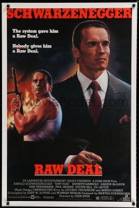 9b603 RAW DEAL 1sh '86 art of tough guy Arnold Schwarzenegger with gun & in suit!