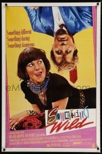 9e928 SOMETHING WILD video poster '86 great image of Melanie Griffith & upside-down Jeff Daniels!