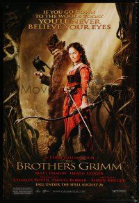 9m158 BROTHERS GRIMM advance DS 1sh '05 sexy Lena Headey with bow and arrow!