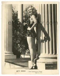 9y127 BETTY GRABLE 8x10.25 still '30s full-length portrait in sexy swimsuit standing by column!