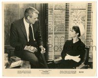 9y188 CHARADE 8x10 still '63 c/u of Cary Grant sitting on desk talking to pretty Audrey Hepburn!