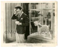 9y239 DEVIL TO PAY 8x10 still '30 c/u of confused Ronald Colman standing outside pet store!