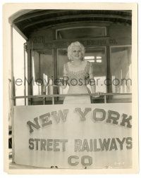 9y454 JEAN HARLOW 8x10.25 still '30s smiling & standing on the back of a New York railroad train!