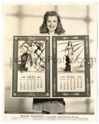 9y667 PEGGY KNUDSEN 8x10 key book still '46 showing off faux calendar portraits for 1901 & 1946!