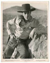9y962 WESTERNER 8x10.25 still '40 best portrait of smoking cowboy Gary Cooper leaning on rock!