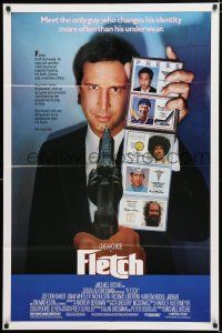 9z396 FLETCH 1sh '85 Michael Ritchie, wacky detective Chevy Chase has gun pulled on him!