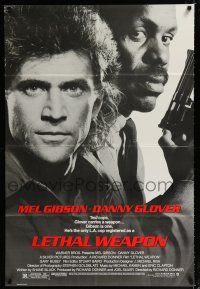 9z576 LETHAL WEAPON 1sh '87 great close image of cop partners Mel Gibson & Danny Glover!