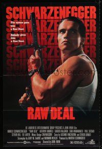 9z755 RAW DEAL 1sh '86 image of tough guy Arnold Schwarzenegger with gun!