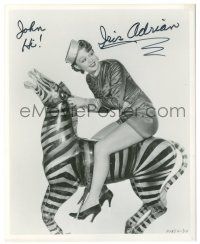 1a761 IRIS ADRIAN signed 8x10 REPRO still '80s riding on carousel zebra showing her sexy legs!