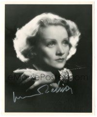 1a836 MARLENE DIETRICH signed 8.25x10 REPRO still '80s portrait with chin on forearm & diamonds