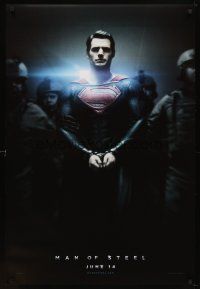 1d514 MAN OF STEEL teaser DS 1sh '13 Henry Cavill in the title role as Superman handcuffed!