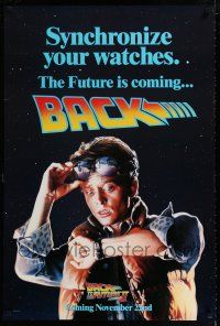 1k066 BACK TO THE FUTURE II teaser DS 1sh '89 Michael J. Fox as Marty, synchronize your watch!