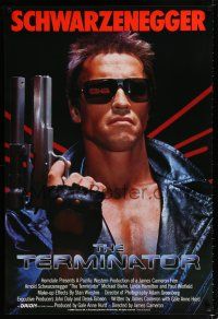 1k753 TERMINATOR int'l 1sh '84 close up of classic cyborg Arnold Schwarzenegger with gun!