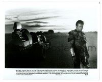1m610 MAD MAX 2: THE ROAD WARRIOR 8x9.75 still '82 best image of Mel Gibson standing by his car!