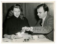 1m764 RITA HAYWORTH 7x9 news photo '49 husband Prince Aly Khan pours milk for her in Switzerland!