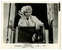 1m802 SEVEN YEAR ITCH 8x10.25 still '55 c/u of sexy Marilyn Monroe holding shoes at window!