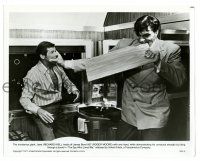 1m851 SPY WHO LOVED ME 8x10.25 still '77 Kiel as Jaws holds Moore as James Bond as he bites board!