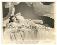 1m854 STAR SPANGLED RHYTHM 8x10 still '43 sexy Susan Hayward laying on bed in nightgown!