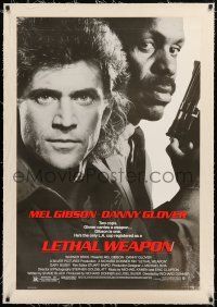 1t165 LETHAL WEAPON linen 1sh '87 great close image of cop partners Mel Gibson & Danny Glover!