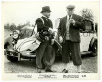 2d419 GOLDFINGER 8.25x10.25 still '64 Harold Sakata & Gert Froebe w/ golf clubs stand by Rolls Royce
