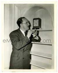 2d442 KAY KYSER 8x10.25 still '40s taking notes from clock face on wall shelf!