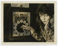 2d499 IT candid 8x10 still '27 Clara Bow spends half her paycheck at a fortune telling machine!