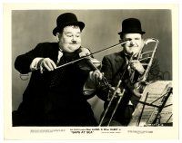 2d794 SAPS AT SEA 8x10.25 still '40 Oliver Hardy with violin pokes Stan Laurel with his bow!