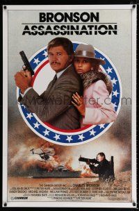 2f078 ASSASSINATION 1sh '86 Jill Ireland, close-up of Charles Bronson with rocket launcher!