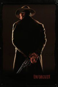 2f811 UNFORGIVEN undated teaser 1sh '92 classic image of gunslinger Clint Eastwood w/back turned!