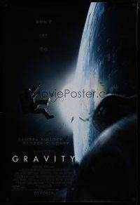 2m311 GRAVITY October advance DS 1sh '13 Sandra Bullock, George Clooney, adrift in space!