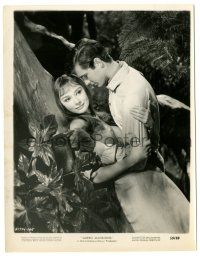2z409 GREEN MANSIONS 8x10.25 still '59 c/u of Audrey Hepburn & Anthony Perkins embracing by tree!