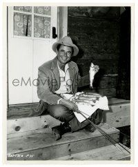 2z518 JUBAL 8.25x10 candid still '56 cowboy Glenn Ford showing the fish he caught between scenes!