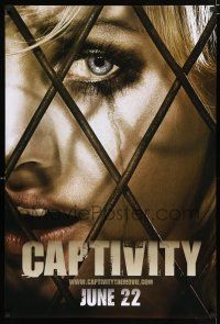 3b146 CAPTIVITY teaser DS 1sh '07 Elisha Cuthbert, Gillies, creepy image of girl behind fence!
