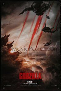 3b305 GODZILLA teaser DS 1sh '14 image of soldiers parachuting over monster & burning city!