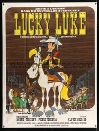 3e502 LUCKY LUKE French 1p '71 great cartoon art of the smoking cowboy hero on his horse!