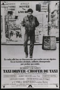 3g175 TAXI DRIVER Argentinean '76 Robert De Niro walking on street, directed by Martin Scorsese!