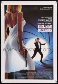 3p221 LIVING DAYLIGHTS linen int'l 1sh '87 Dalton as James Bond & sexy Maryam d'Abo with gun!