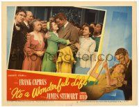 3t323 IT'S A WONDERFUL LIFE LC #5 '46 James Stewart hugging Donna Reed in crowd, Frank Capra!