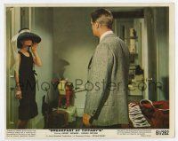 3y011 BREAKFAST AT TIFFANY'S color 8x10 still '61 sexy Audrey Hepburn wearing hat stares at Peppard!