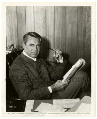 3y192 CARY GRANT 8.25x10 still '59 sitting in his office reading Operation Petticoat script!