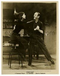 3y351 FUNNY FACE 8x10.25 still '57 Fred Astaire invites seated Audrey Hepburn to dance with him!