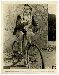 3y482 JANIS PAIGE 8x10.25 still '44 sexy c/u on bicycle, making her debut in Hollywood Canteen!