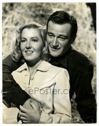 3y552 LADY TAKES A CHANCE 7x9 news photo '43 John Wayne with his arm around pretty Jean Arthur!