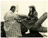 3y589 MABEL NORMAND 7.5x9.5 still '10s a Native American woman is lacing a moccasin on her foot!
